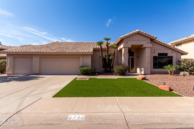 3740 W Kent Dr, Chandler, AZ 85226 - view of front of house with a garage, stucco siding, concrete driveway, a front lawn, and a tiled roof