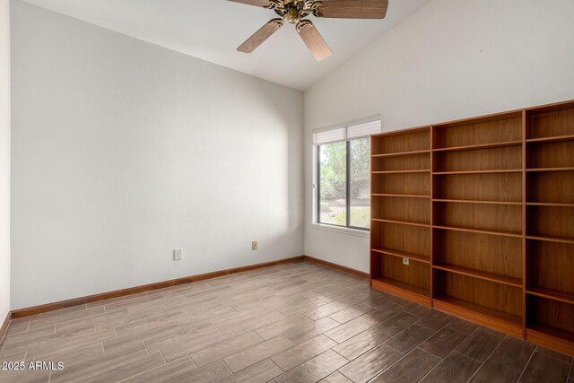 3740 W Kent Dr, Chandler, AZ 85226 - empty room with wood tiled floors, baseboards, vaulted ceiling, and a ceiling fan