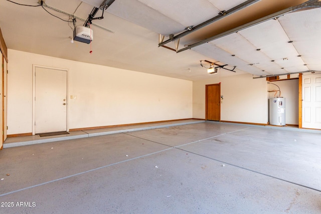 3740 W Kent Dr, Chandler, AZ 85226 - garage featuring electric water heater, a garage door opener, and baseboards