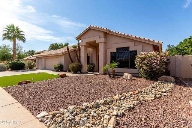 3740 W Kent Dr, Chandler, AZ 85226 - view of front facade featuring an attached garage, driveway, stucco siding, and a tile roof
