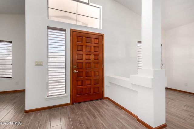 3740 W Kent Dr, Chandler, AZ 85226 - entryway with wood finished floors, baseboards, and high vaulted ceiling