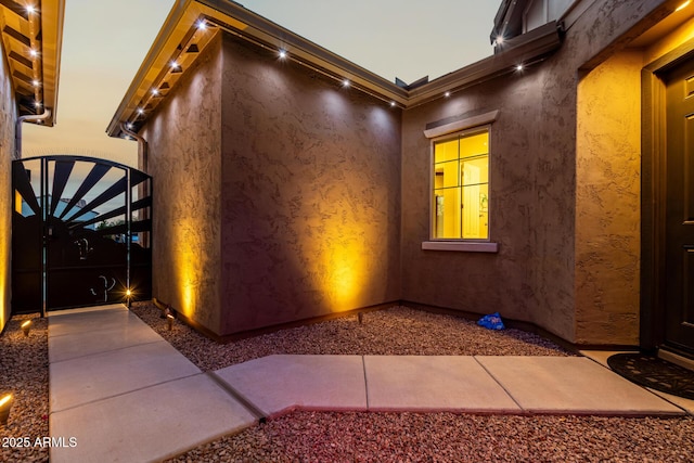 exterior space featuring stucco siding