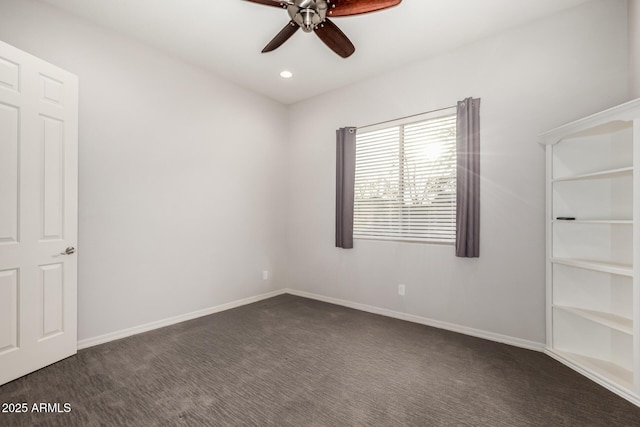 unfurnished room featuring dark colored carpet, recessed lighting, a ceiling fan, and baseboards