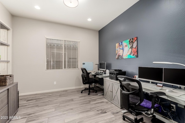 office featuring recessed lighting, light wood-style flooring, and baseboards