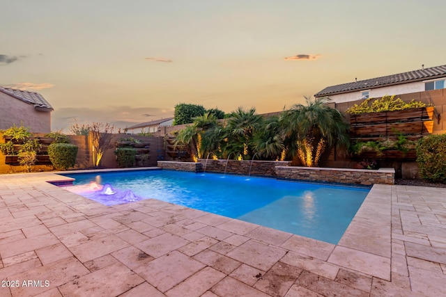 view of swimming pool with a patio, a fenced backyard, and a fenced in pool