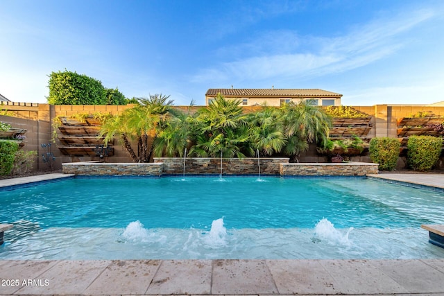 view of swimming pool with a fenced backyard and a fenced in pool