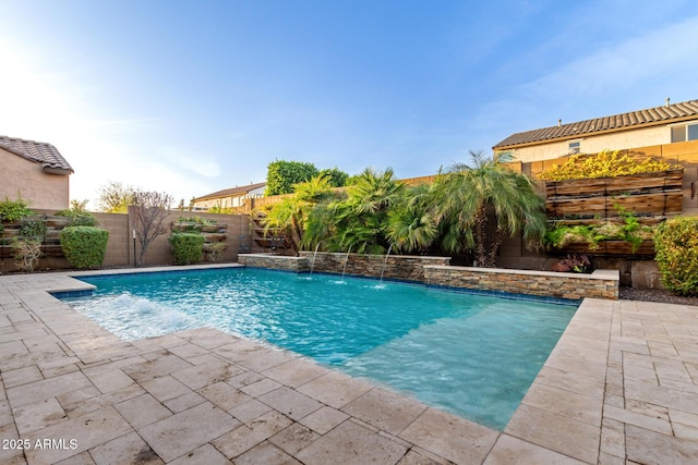 view of pool featuring a patio area, a fenced backyard, and a fenced in pool