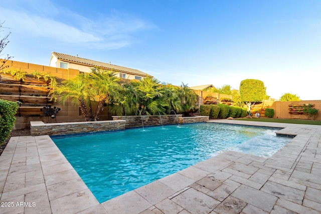 view of swimming pool featuring a patio, a fenced backyard, and a fenced in pool