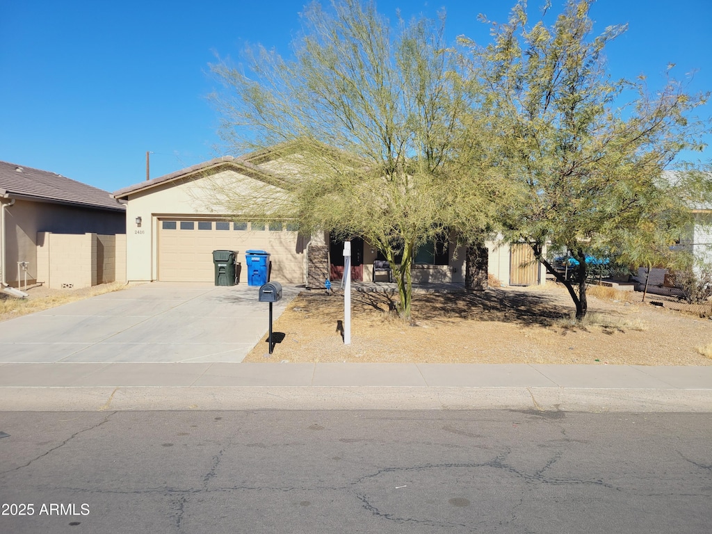 view of front of home with a garage