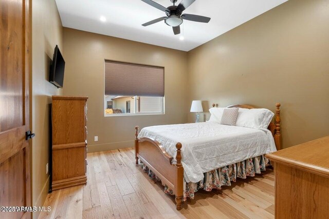 1568 Gettysvue Way, Prescott, AZ 86301 - bedroom featuring light wood-style flooring, baseboards, and ceiling fan