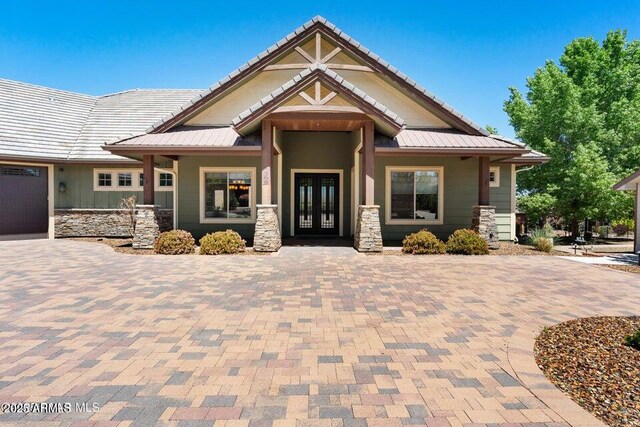 1568 Gettysvue Way, Prescott, AZ 86301 - craftsman-style home featuring french doors, stone siding, and metal roof