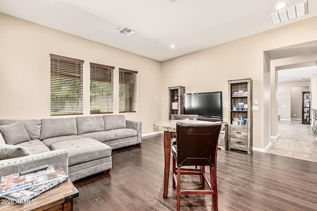 7242 W Rowel Rd, Peoria, AZ 85383 - living area with dark wood-style floors and recessed lighting