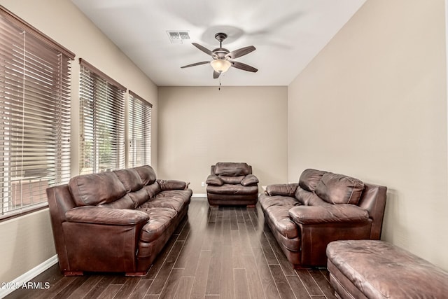 7242 W Rowel Rd, Peoria, AZ 85383 - living area with a ceiling fan and dark wood-style floors