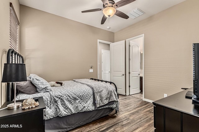 7242 W Rowel Rd, Peoria, AZ 85383 - bedroom featuring wood finished floors and a ceiling fan