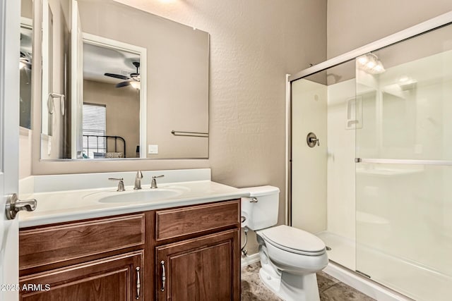 7242 W Rowel Rd, Peoria, AZ 85383 - full bathroom featuring a shower stall, vanity, a ceiling fan, and a textured wall