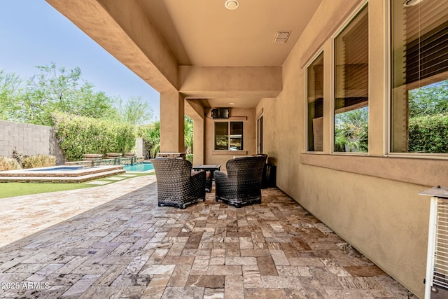 7242 W Rowel Rd, Peoria, AZ 85383 - view of patio with an in-ground hot tub
