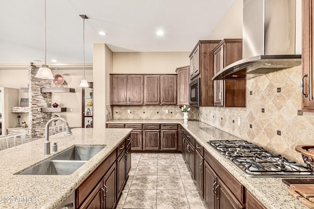 7242 W Rowel Rd, Peoria, AZ 85383 - kitchen featuring ventilation hood, appliances with stainless steel finishes, decorative light fixtures, light stone counters, and recessed lighting