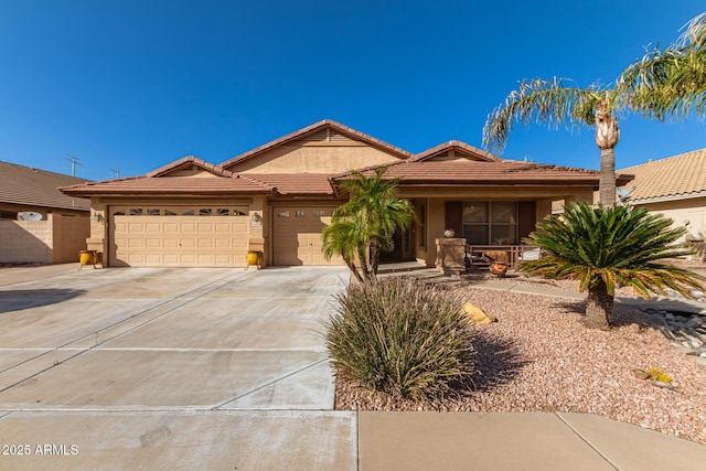 view of front of property with a garage