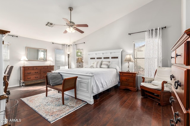 bedroom with ceiling fan, dark hardwood / wood-style floors, and lofted ceiling