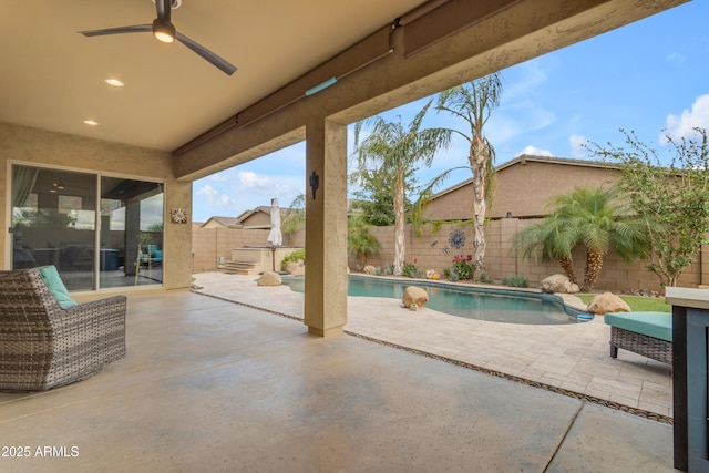 view of patio / terrace featuring a fenced backyard and a ceiling fan