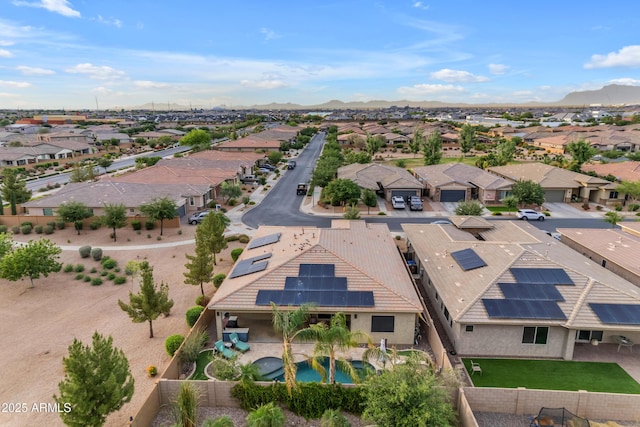 aerial perspective of suburban area featuring a mountainous background