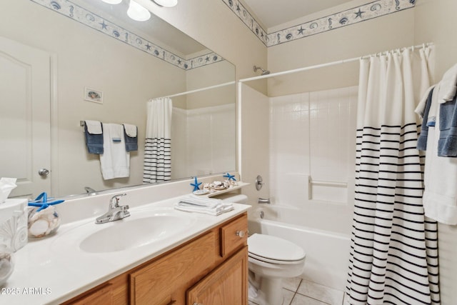 full bathroom featuring tile patterned flooring, vanity, toilet, and shower / bathtub combination with curtain