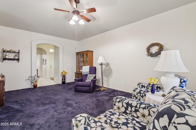 bedroom featuring light carpet and ceiling fan