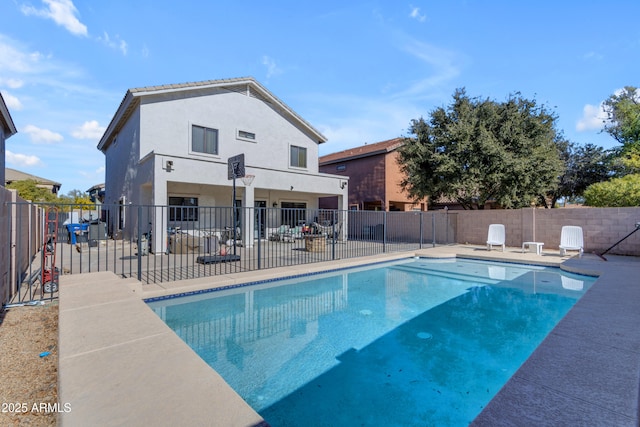 view of pool featuring a patio area