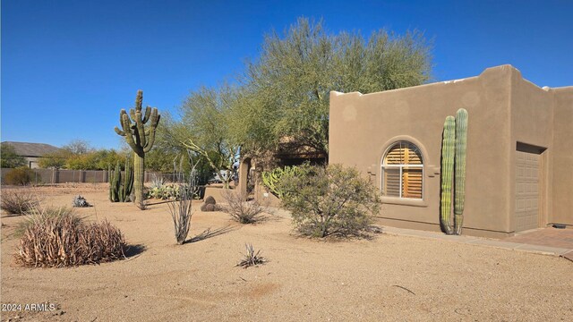 2926 W Tanya Trl, Phoenix, AZ 85086 - view of side of property with stucco siding