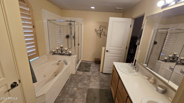 2926 W Tanya Trl, Phoenix, AZ 85086 - full bathroom with a shower stall, a whirlpool tub, double vanity, recessed lighting, and stone finish floors