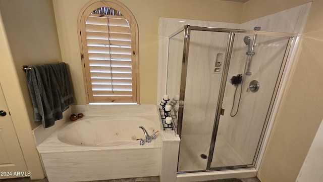 2926 W Tanya Trl, Phoenix, AZ 85086 - bathroom featuring a tub with jets and a stall shower