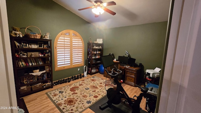 office space featuring hardwood / wood-style flooring, vaulted ceiling, and ceiling fan