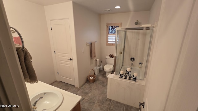 2926 W Tanya Trl, Phoenix, AZ 85086 - bathroom featuring toilet, tile patterned floors, vanity, and recessed lighting