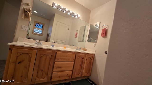 bathroom featuring vanity and tile patterned floors