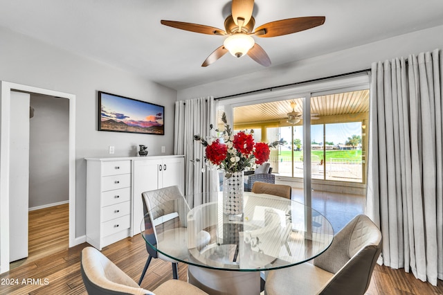 dining area featuring ceiling fan and hardwood / wood-style flooring