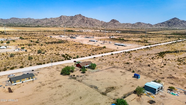 bird's eye view featuring a rural view and a mountain view