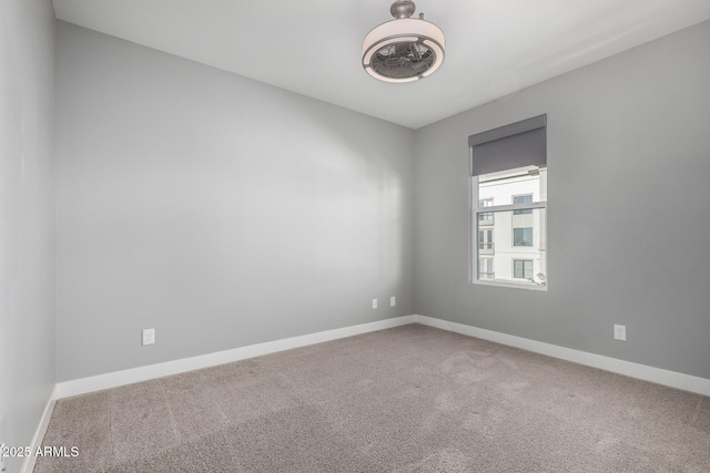 spare room featuring carpet floors