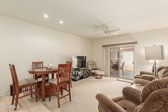 interior space featuring light tile patterned floors, ceiling fan, light colored carpet, and recessed lighting