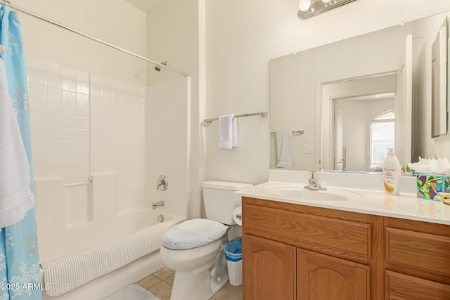 bathroom featuring toilet, tile patterned flooring, shower / bath combo with shower curtain, and vanity