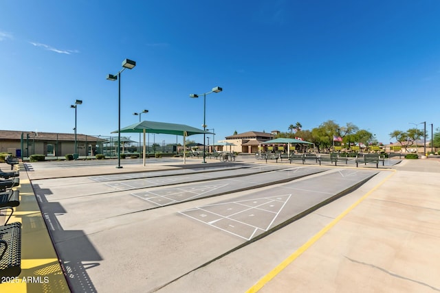 view of property's community with shuffleboard