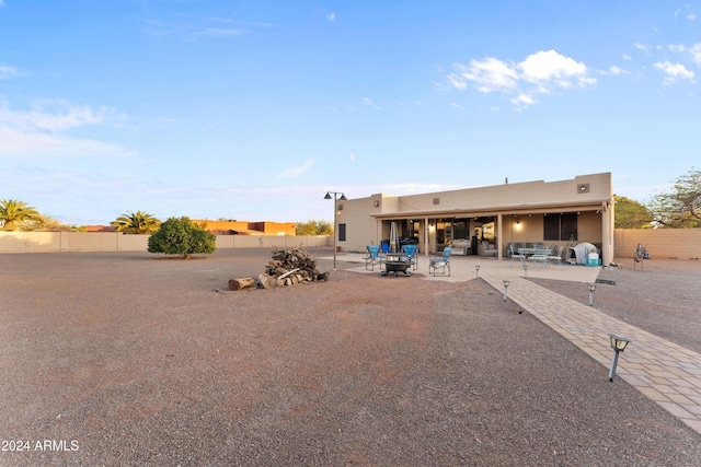 rear view of house featuring a patio