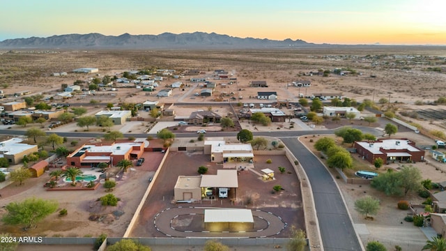 aerial view at dusk with a mountain view