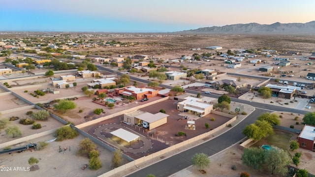 aerial view at dusk with a mountain view