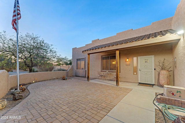 exterior space with a patio area