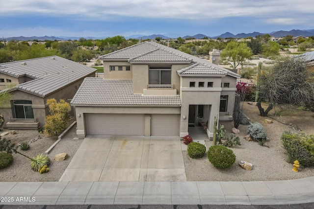 4864 E Eden Dr, Cave Creek, AZ 85331 - mediterranean / spanish-style home with a tile roof, stucco siding, a mountain view, and driveway