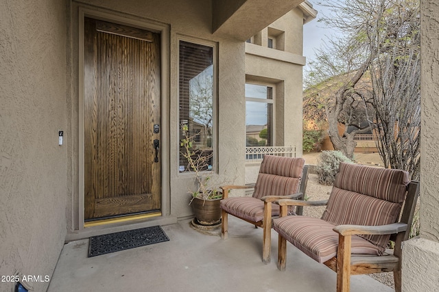 4864 E Eden Dr, Cave Creek, AZ 85331 - doorway to property with stucco siding and a patio area