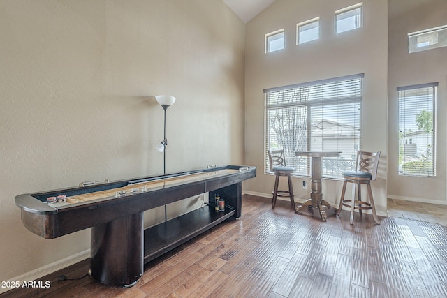 4864 E Eden Dr, Cave Creek, AZ 85331 - home office featuring baseboards, high vaulted ceiling, and wood finished floors