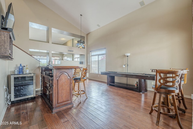 4864 E Eden Dr, Cave Creek, AZ 85331 - kitchen featuring baseboards, dark wood-style flooring, decorative light fixtures, and beverage cooler