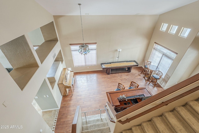 4864 E Eden Dr, Cave Creek, AZ 85331 - living area with pool table, visible vents, high vaulted ceiling, and wood finished floors