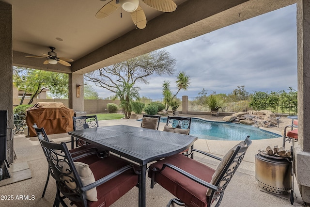 4864 E Eden Dr, Cave Creek, AZ 85331 - view of patio / terrace featuring a fenced backyard, outdoor dining space, and a fenced in pool